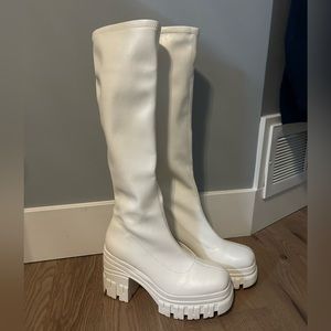 Call it Spring, knee length white boots